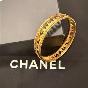 CHANEL Gold Logo Bangle Bracelet